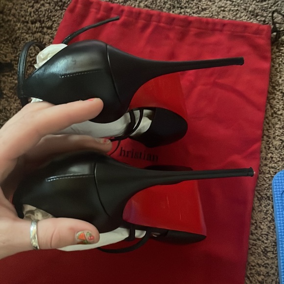 Christian Louboutin red bottom heels. - Picture 8 of 11